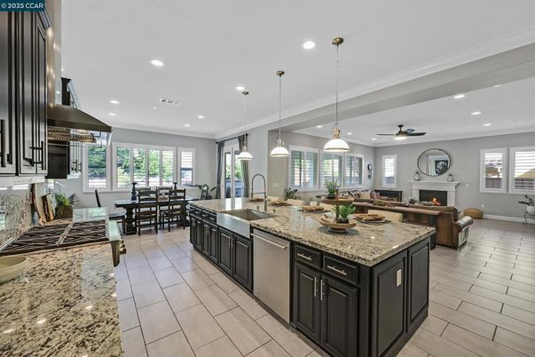 Dining room, Fireplace, Interior, Kitchen, Living room, Pendant Lights, Recessed Lighting, Stainless Steel Appliances