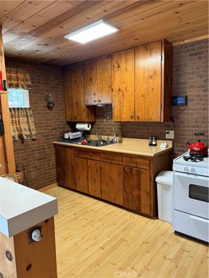 Interior, Kitchen, Recessed Lighting, Stone Walls, Wooden Ceilings, Wood Texture Flooring
