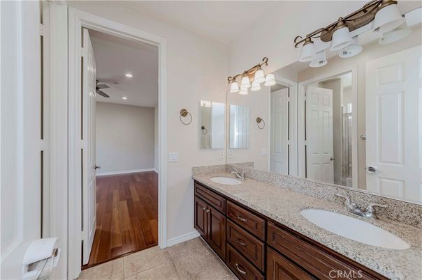 Bathroom, Dual Sink Vanities, Interior, Recessed Lighting, Wood Texture Flooring