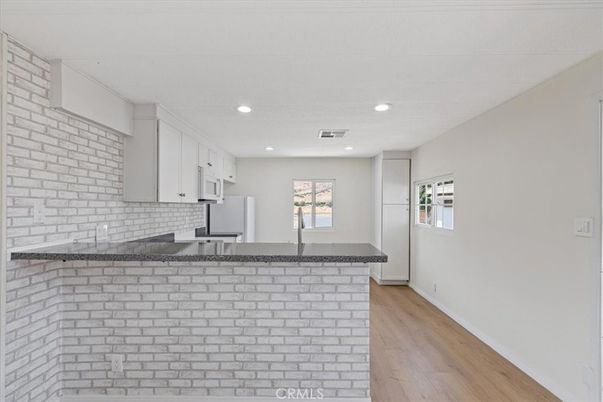 Interior, Kitchen, Recessed Lighting, Stone Walls, Wood Texture Flooring