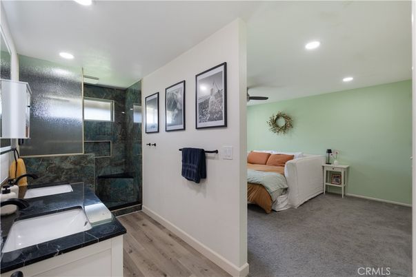 Bathroom, Bedroom, Glass Shower, Interior, Recessed Lighting, Wood Texture Flooring