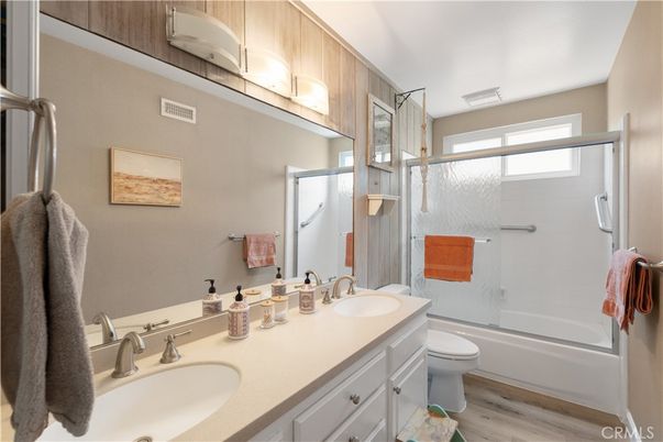 Bathroom, Dual Sink Vanities, Glass Shower, Interior, Wood Texture Flooring