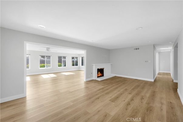 Empty room, Fireplace, Interior, Recessed Lighting, Wood Texture Flooring
