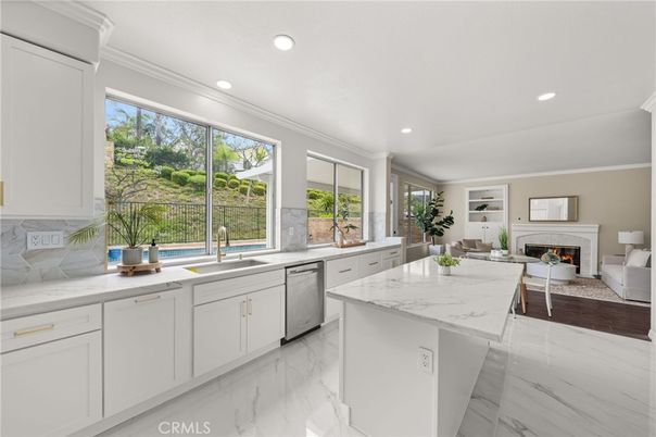 Fireplace, Interior, Kitchen, Living room, Marble, Recessed Lighting, Stainless Steel Appliances