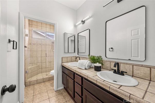 Bathroom, Dual Sink Vanities, Glass Shower, Interior, Tile Countertops