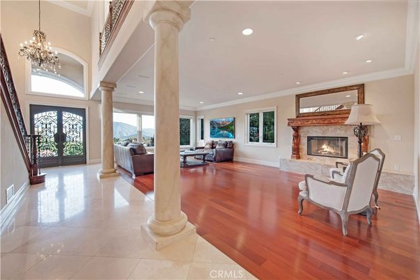 Chandelier, Fireplace, Interior, Living room, Recessed Lighting, Wood Texture Flooring