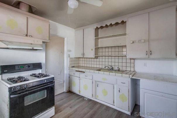 Interior, Kitchen, Tile Countertops, Wood Texture Flooring