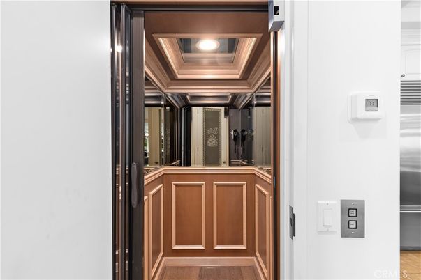 Elevator, Interior, Recessed Lighting, Wooden Ceilings, Wood Texture Flooring