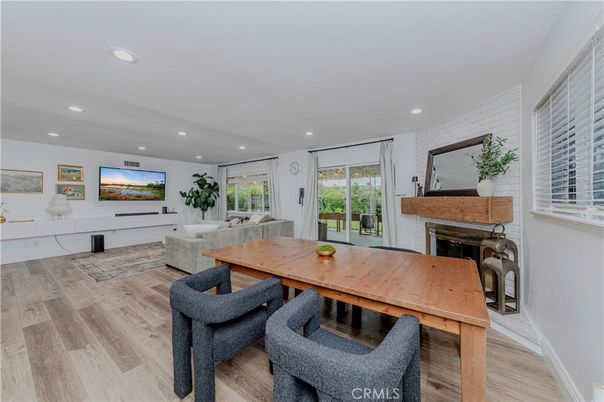 Dining room, Fireplace, Interior, Living room, Recessed Lighting, Wood Texture Flooring