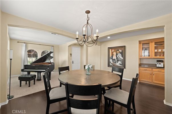 Chandelier, Dining room, Interior, Piano, Recessed Lighting, Wood Texture Flooring