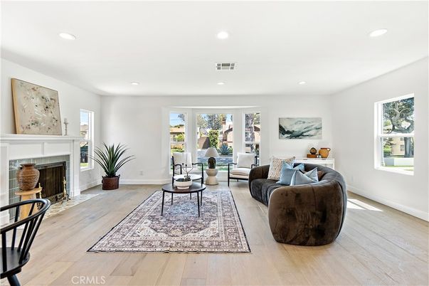 Fireplace, Interior, Living room, Recessed Lighting, Wood Texture Flooring