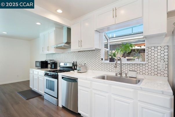 Interior, Kitchen, Recessed Lighting, Stainless Steel Appliances, Wood Texture Flooring