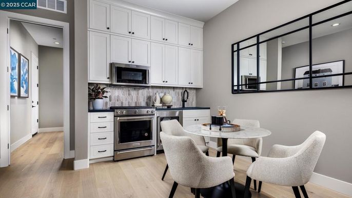 Dining room, Interior, Kitchen, Recessed Lighting, Stainless Steel Appliances, Wood Texture Flooring