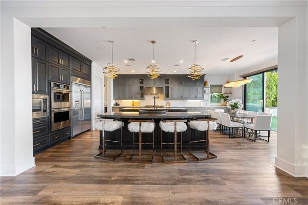 Dining room, Interior, Kitchen, Pendant Lights, Recessed Lighting, Stainless Steel Appliances, Wood Texture Flooring