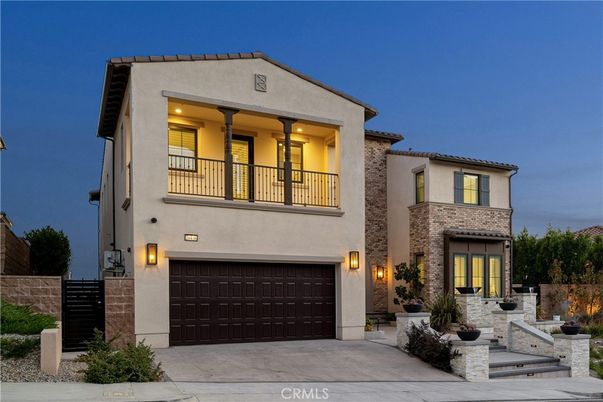 Attached, Exterior, Facade, Brick Facade, Mediterranean