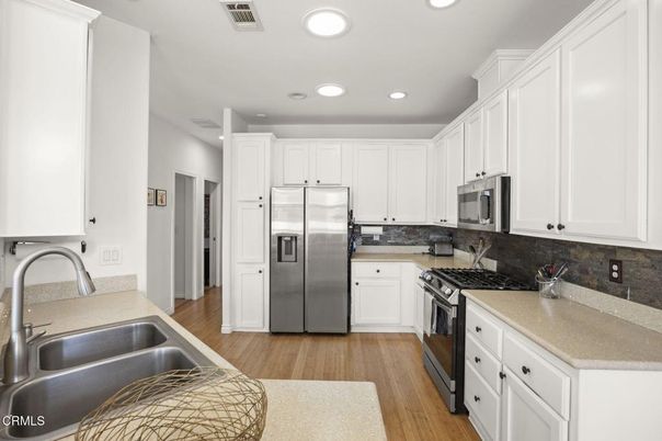 Interior, Kitchen, Recessed Lighting, Stainless Steel Appliances, Wood Texture Flooring