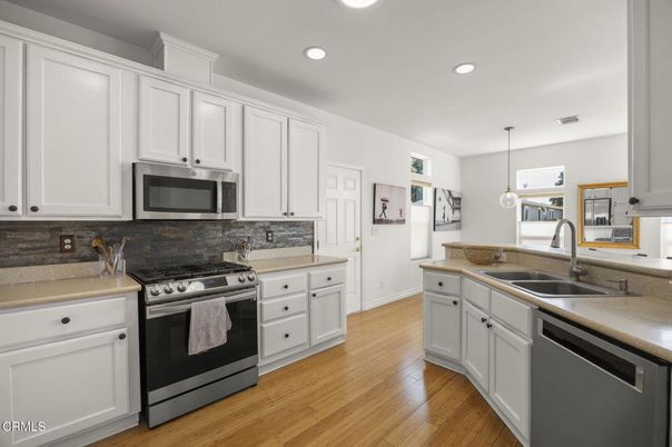 Interior, Kitchen, Pendant Lights, Recessed Lighting, Stainless Steel Appliances, Wood Texture Flooring