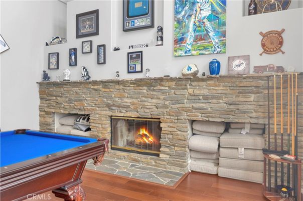 Billiard Table, Fireplace, Game Room, Interior, Stone Walls, Wood Texture Flooring