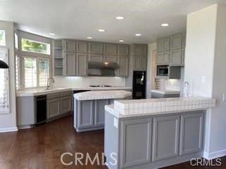 Interior, Kitchen, Recessed Lighting, Stainless Steel Appliances, Tile Countertops, Wood Texture Flooring