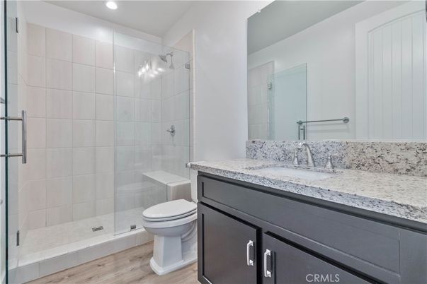 Bathroom, Glass Shower, Interior, Recessed Lighting, Wood Texture Flooring