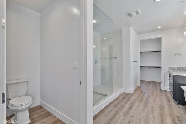 Bathroom, Glass Shower, Interior, Recessed Lighting, Wood Texture Flooring