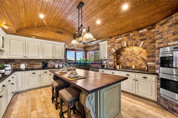 Interior, Kitchen, Pendant Lights, Recessed Lighting, Stainless Steel Appliances, Stone Walls, Wooden Ceilings, Wood Texture Flooring