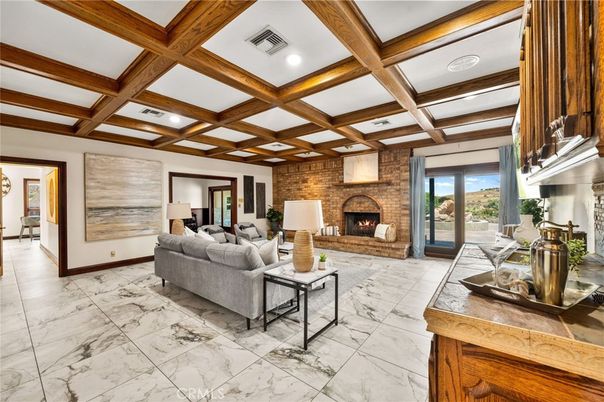 Fireplace, Interior, Living room, Marble, Recessed Lighting, Stone Walls, Wooden Beams