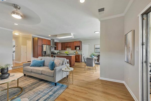 Dining room, Interior, Kitchen, Living room, Recessed Lighting, Stainless Steel Appliances, Wood Texture Flooring