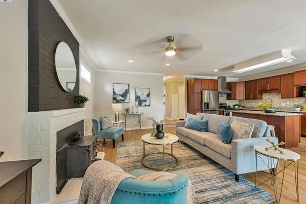 Fireplace, Interior, Kitchen, Living room, Recessed Lighting, Stainless Steel Appliances, Stone Walls, Wood Texture Flooring