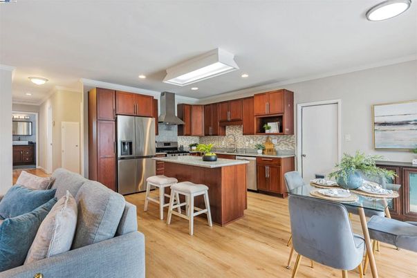 Dining room, Interior, Kitchen, Living room, Recessed Lighting, Stainless Steel Appliances, Wood Texture Flooring