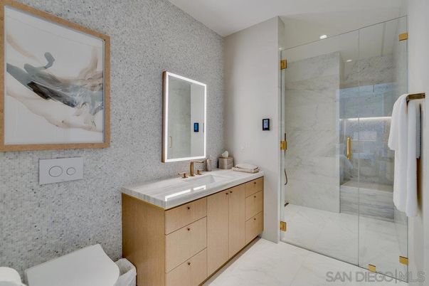 Bathroom, Dual Sink Vanities, Glass Shower, Interior, Marble, Marble Walls, Recessed Lighting