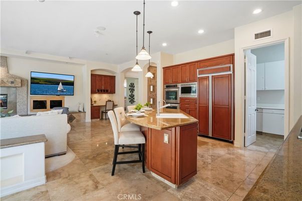 Fireplace, Interior, Kitchen, Living room, Pendant Lights, Recessed Lighting, Stainless Steel Appliances