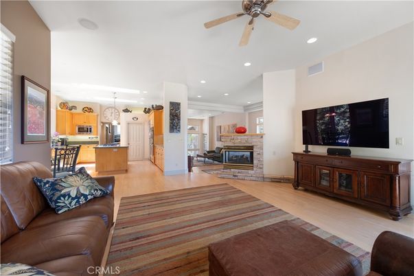 Fireplace, Interior, Kitchen, Living room, Pendant Lights, Recessed Lighting, Stainless Steel Appliances, Wood Texture Flooring