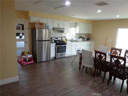 Dining room, Interior, Kitchen, Recessed Lighting, Stainless Steel Appliances, Wood Texture Flooring