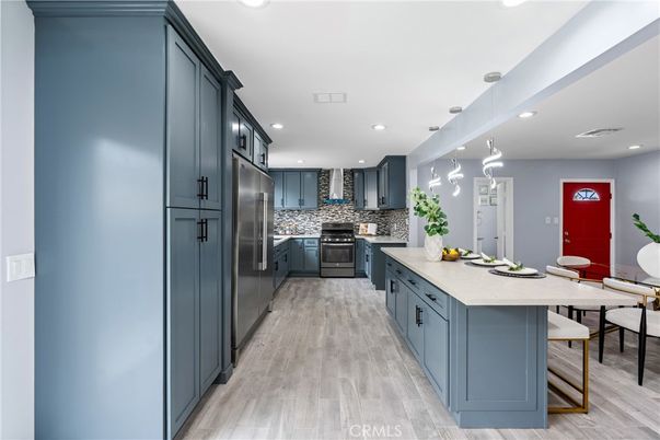 Dining room, Interior, Kitchen, Pendant Lights, Recessed Lighting, Stainless Steel Appliances, Wood Texture Flooring