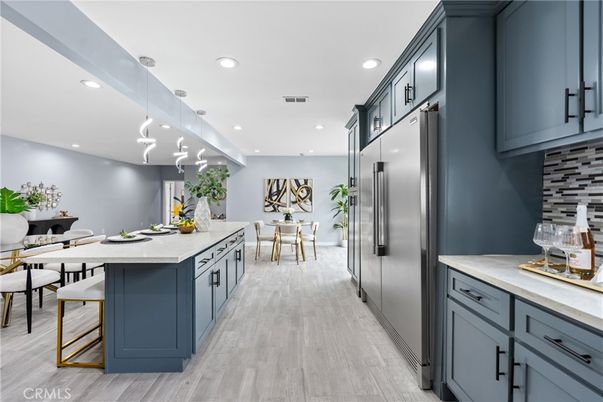 Dining room, Interior, Kitchen, Pendant Lights, Recessed Lighting, Stainless Steel Appliances, Wood Texture Flooring