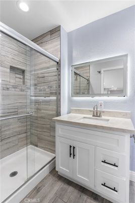Bathroom, Glass Shower, Interior, Recessed Lighting, Wood Texture Flooring