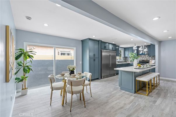 Dining room, Interior, Kitchen, Recessed Lighting, Stainless Steel Appliances, Wood Texture Flooring