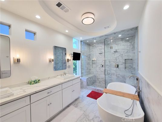 Bathroom, Dual Sink Vanities, Free Standing Baths, Glass Shower, Interior, Marble, Marble Walls, Recessed Lighting