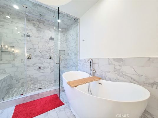 Bathroom, Free Standing Baths, Glass Shower, Interior, Marble, Marble Walls, Recessed Lighting