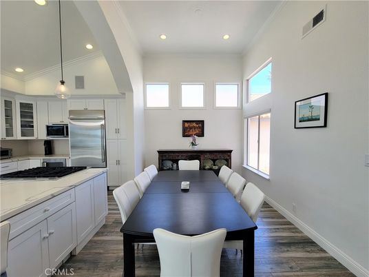 Dining room, Interior, Kitchen, Pendant Lights, Recessed Lighting, Stainless Steel Appliances, Wood Texture Flooring