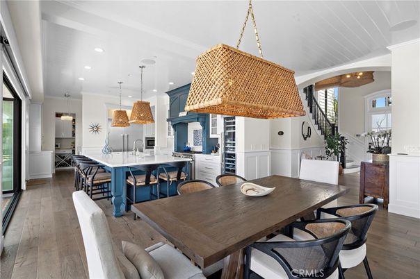 Dining room, Interior, Kitchen, Pendant Lights, Recessed Lighting, Stainless Steel Appliances, Wood Texture Flooring