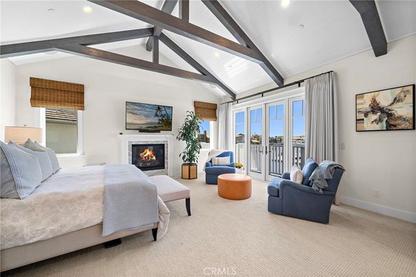 Bedroom, Fireplace, Interior, Recessed Lighting, Water, Wooden Beams