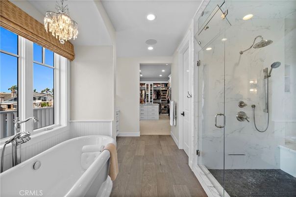 Bathroom, Chandelier, Glass Shower, Interior, Marble Walls, Recessed Lighting, Walk-in Closets, Wood Texture Flooring