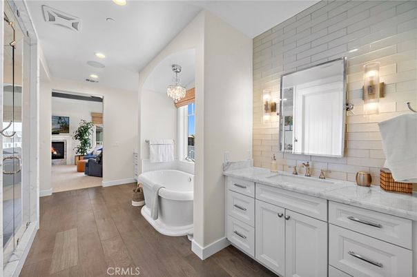 Bathroom, Chandelier, Dual Sink Vanities, Free Standing Baths, Interior, Recessed Lighting, Wood Texture Flooring