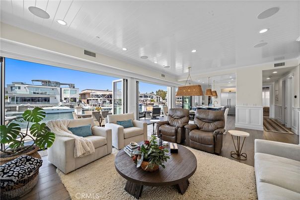 Dining room, Interior, Kitchen, Living room, Pendant Lights, Recessed Lighting, Stainless Steel Appliances, Wood Texture Flooring