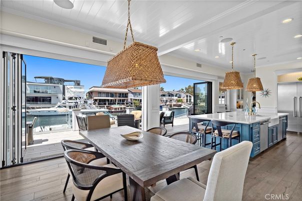 Dining room, Interior, Kitchen, Pendant Lights, Recessed Lighting, Stainless Steel Appliances, Water, Wood Texture Flooring