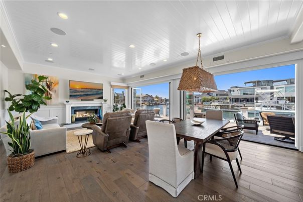 Dining room, Fireplace, Interior, Living room, Pendant Lights, Recessed Lighting, Wood Texture Flooring