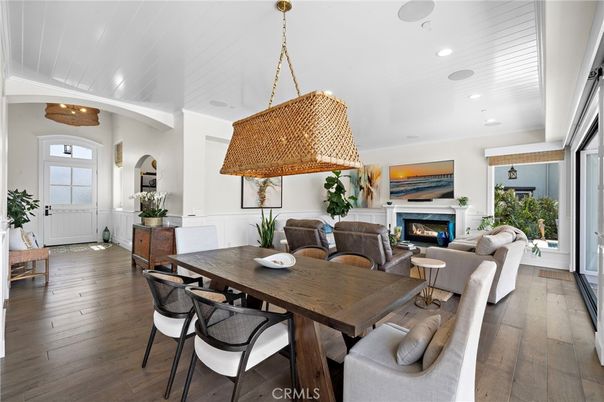 Dining room, Fireplace, Interior, Living room, Pendant Lights, Recessed Lighting, Wood Texture Flooring