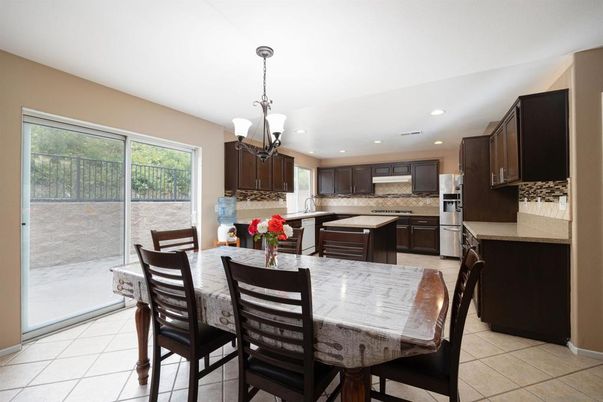 Chandelier, Dining room, Interior, Kitchen, Pendant Lights, Recessed Lighting, Stainless Steel Appliances